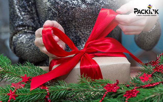 Packink custom printed ribbon on a gift box.