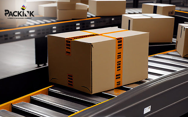 Corrugated shipping box moving on a conveyor belt.