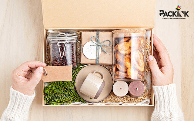 Curated subscription box with coffee, snacks, and a mug.