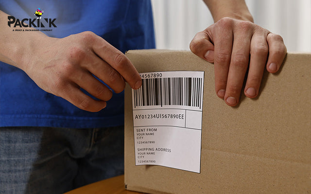 Placing a return label on a package.