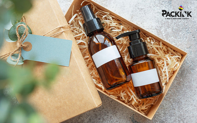 Skincare products in a customized packaging box with paper shreds